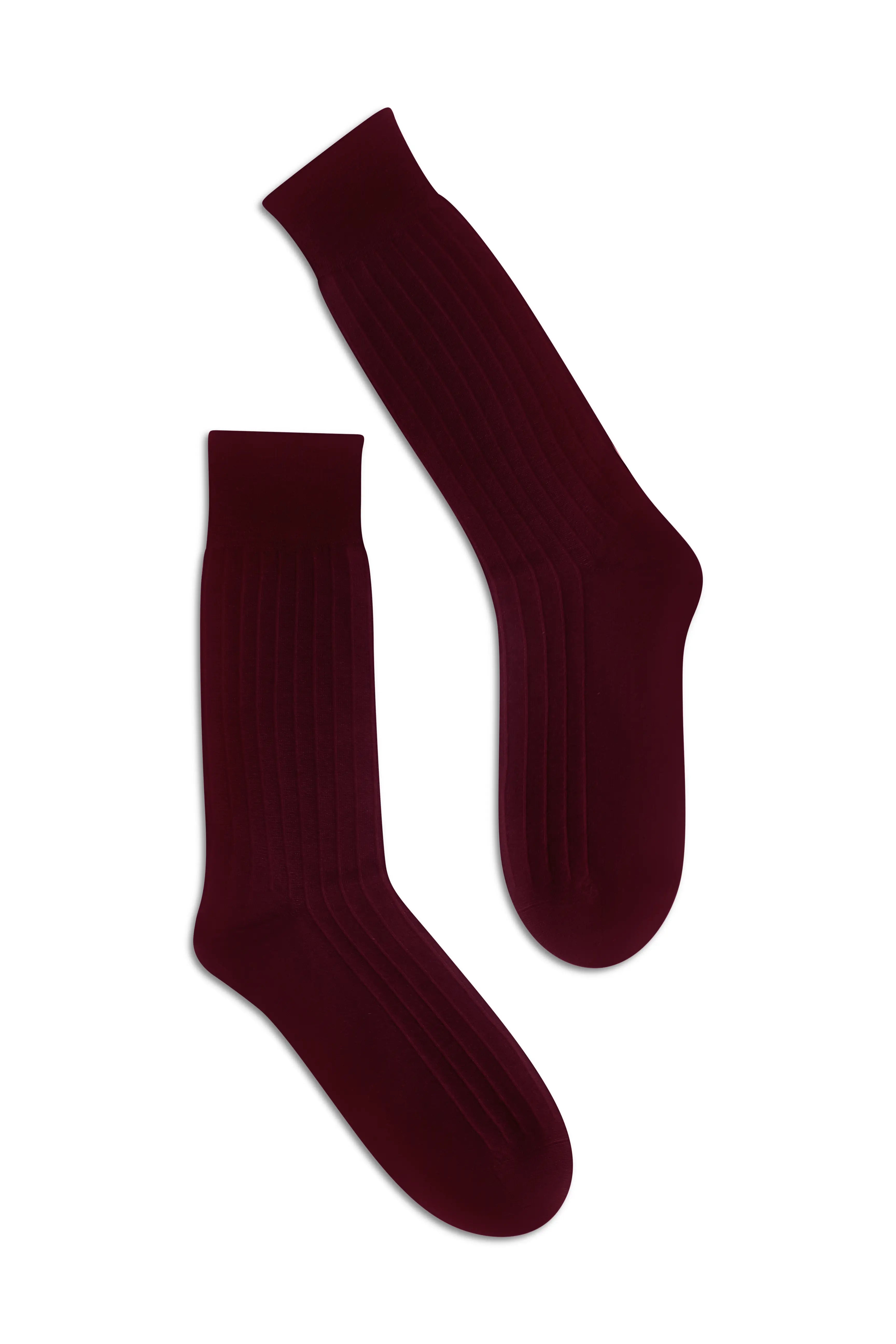 Pair of Bordeaux knee-high socks on a flat lay background