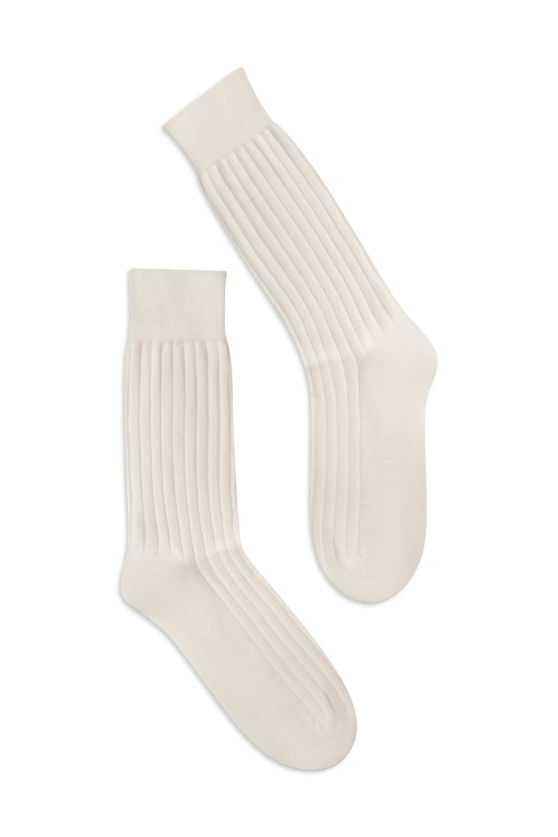 Pair of Panna knee-high socks on a flat lay background - Panna
