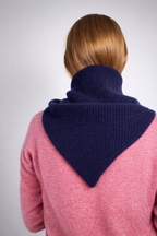 half british lambswool ribbed triangle scarf in navy, draped over the shoulders showing the ribbed knit texture