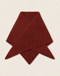 A folded ribbed knit scarf in a deep burgundy red, displayed on a light beige background.