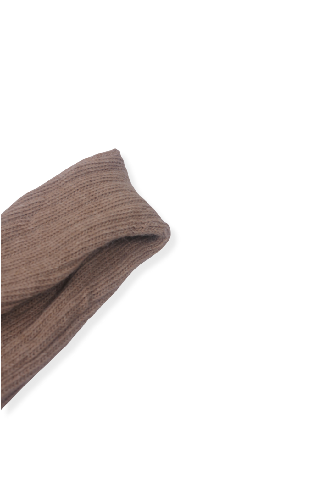 half british alpaca lounge sock in fawn, folded neatly on a background to highlight the ribbed texture and soft alpaca knit