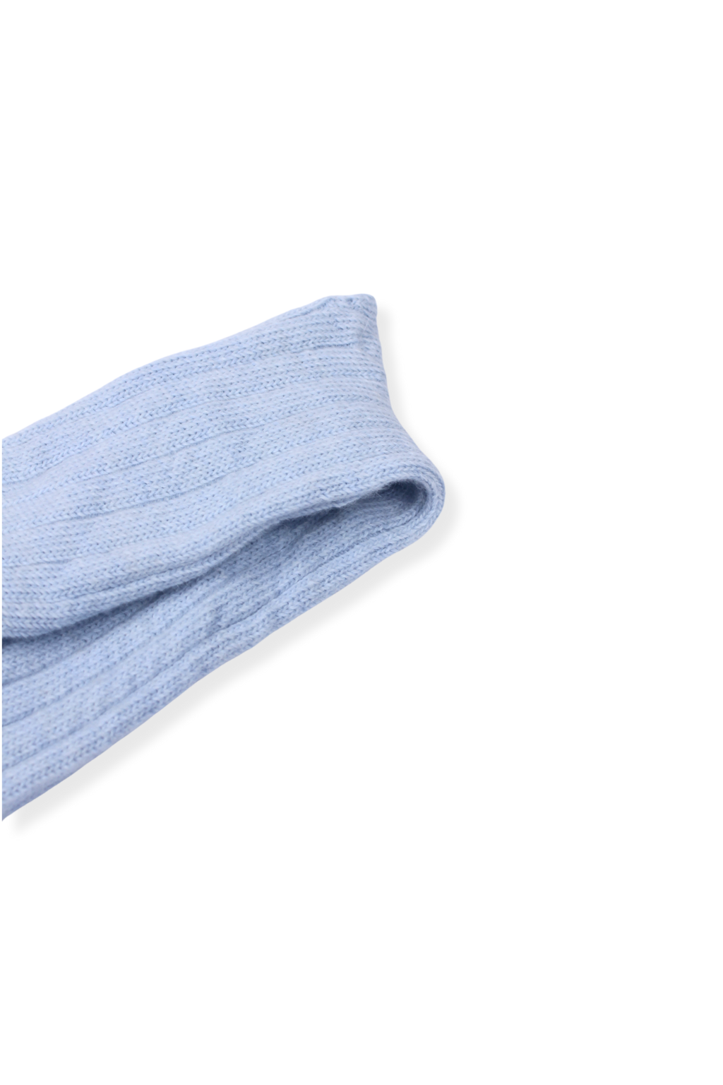 half british alpaca lounge sock in baby blue, folded neatly on a background showing the ribbed knit pattern and soft alpaca texture