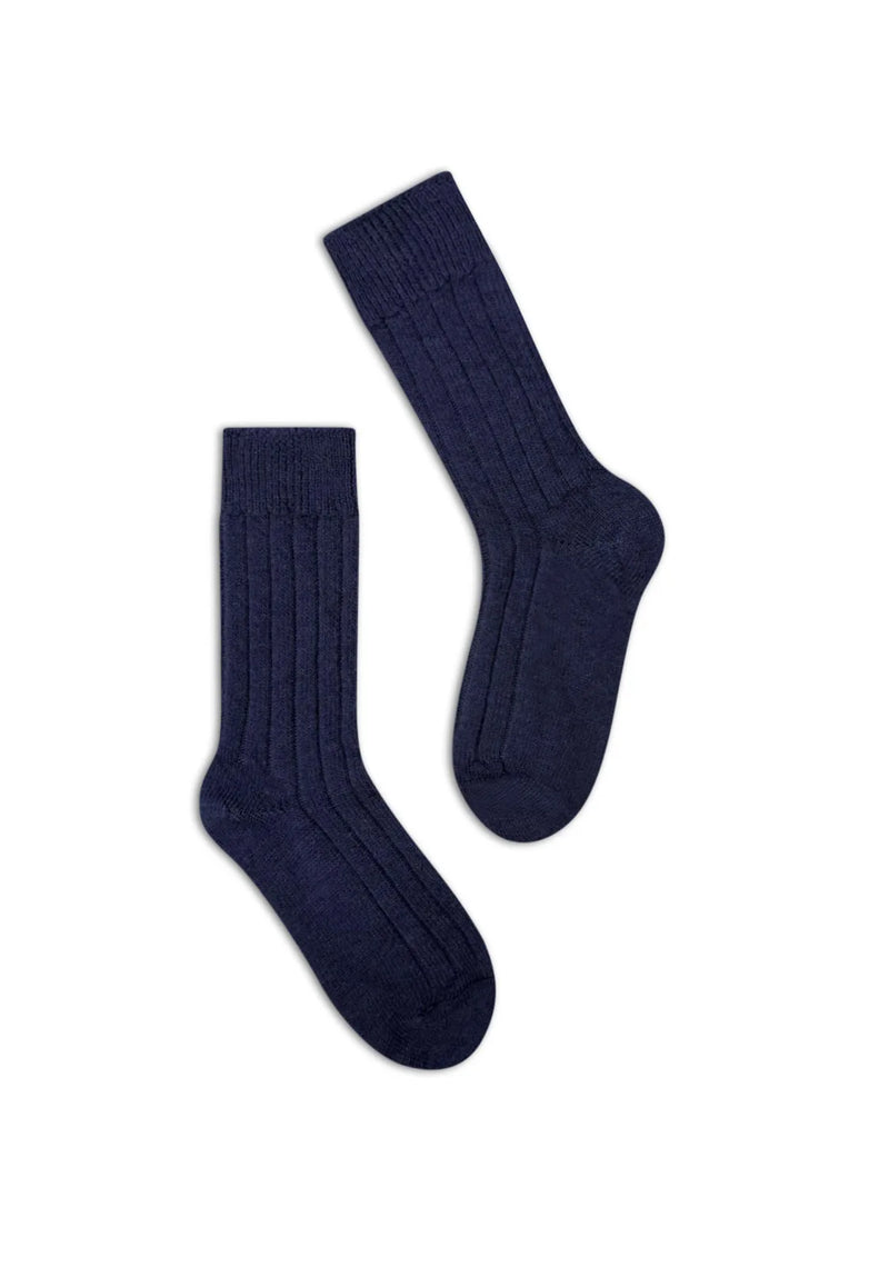 half british alpaca lounge socks in navy, pair laid flat on a background to show the ribbed knit texture and premium alpaca wool finish - Navy