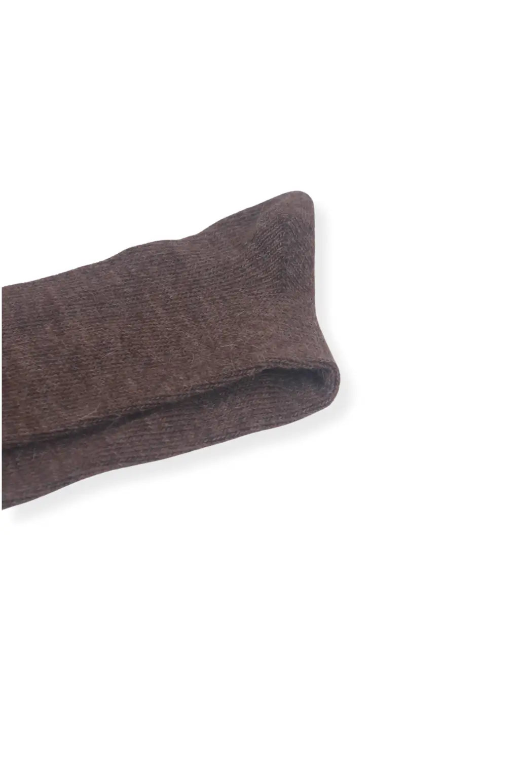 half british everyday alpaca sock in brown, folded neatly on a background to highlight the natural alpaca wool texture and rich brown tone