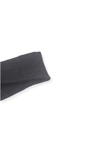 half british everyday alpaca sock in dark chocolate, folded on a background showing the soft alpaca wool texture and fine ribbed knit.