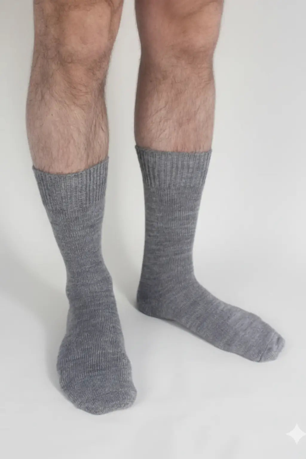 half british everyday alpaca socks in light , worn to highlight the fine ribbed knit and soft alpaca wool texture against a clean background