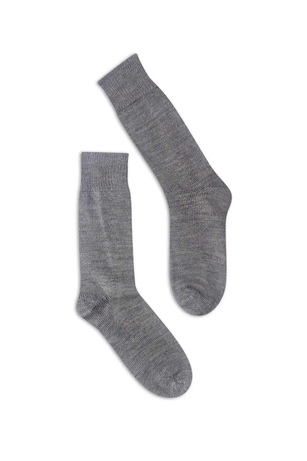half british everyday alpaca socks in light grey, pair laid flat on a background showing the fine ribbed knit and soft alpaca wool texture.