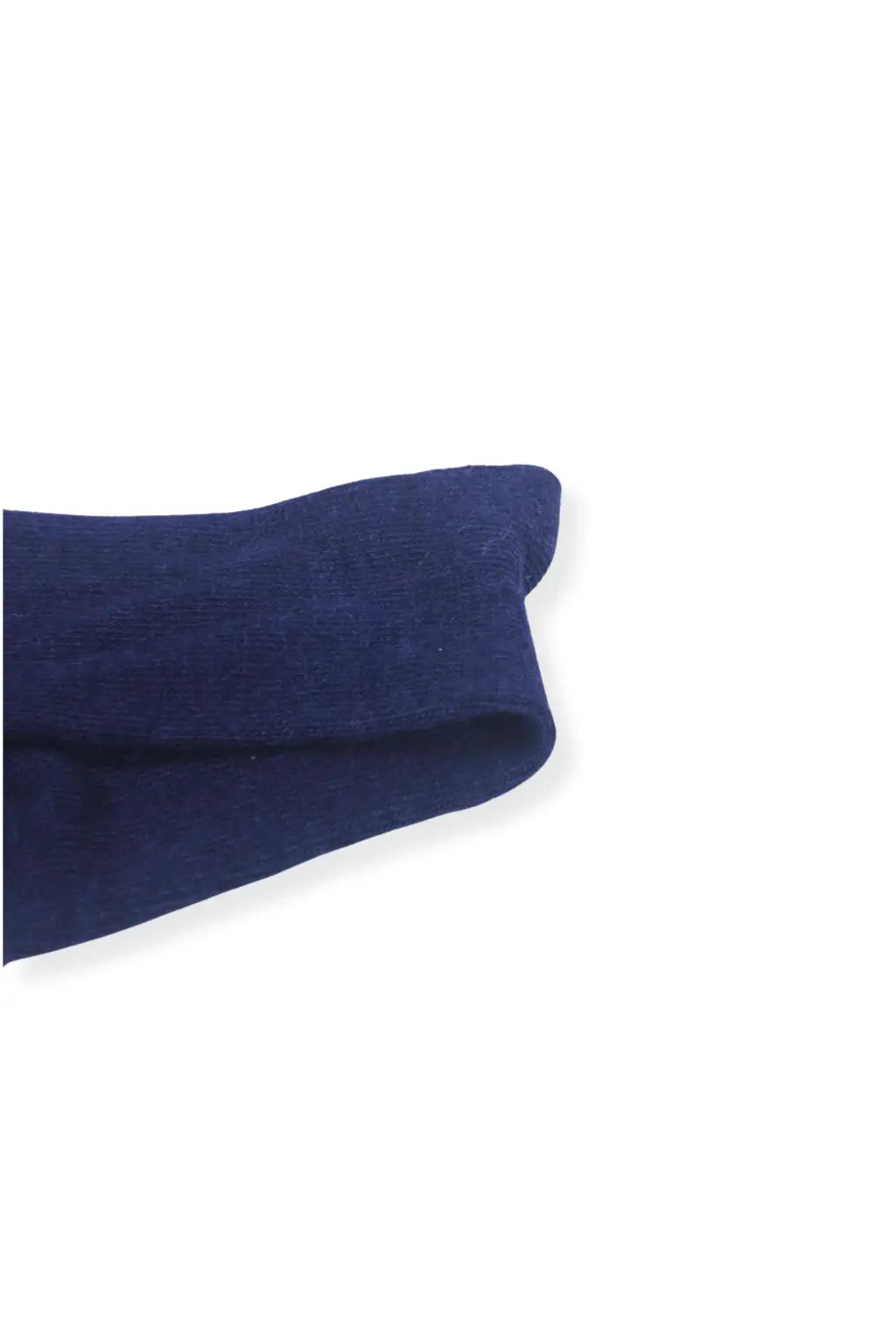 half british everyday alpaca sock in navy, neatly folded on a background showing its soft alpaca wool texture