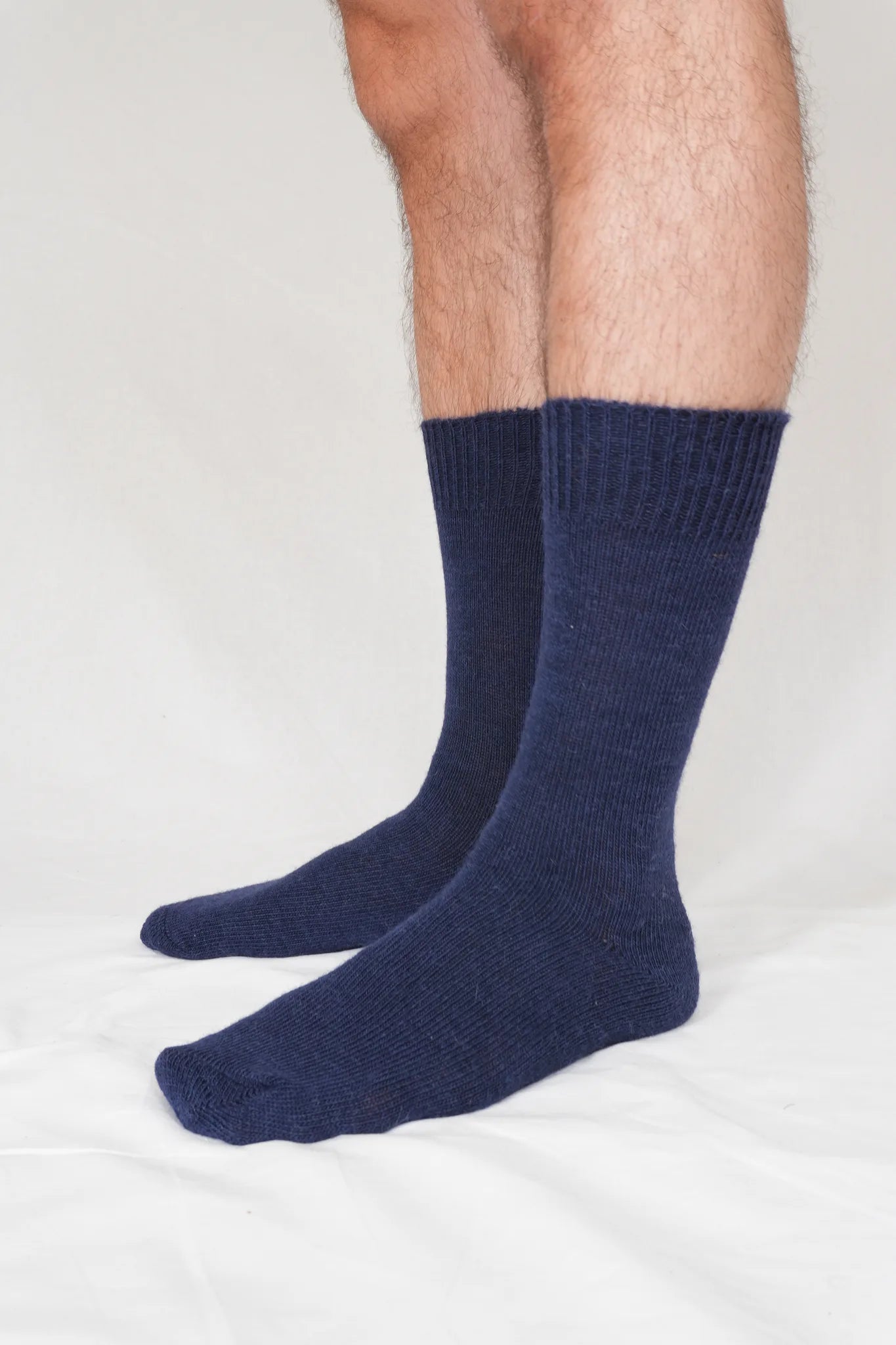 half british Everyday Alpaca Sock in Navy, soft luxury sock crafted from fine Peruvian alpaca wool, photographed on a background