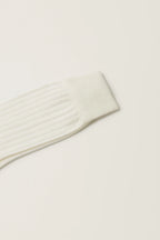 British Merino Wool Dress Socks in Panna on a background